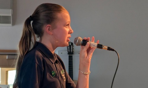 A Hope Valley College student singing at our Primary Music Showcase